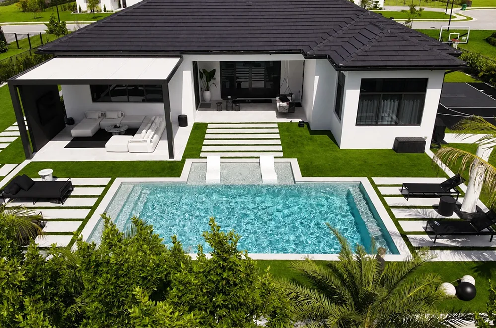 Rectangular pool with spa at a modern home
